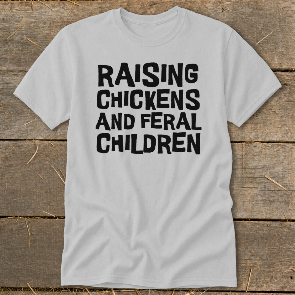 Light grey t-shirt with black text that reads "RAISING CHICKENS AND FERAL CHILDREN".