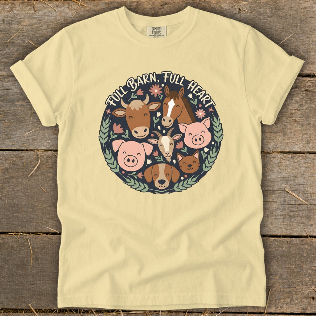 Yellow t-shirt with circular farm animal graphic and text "FULL BARN, FULL HEART".