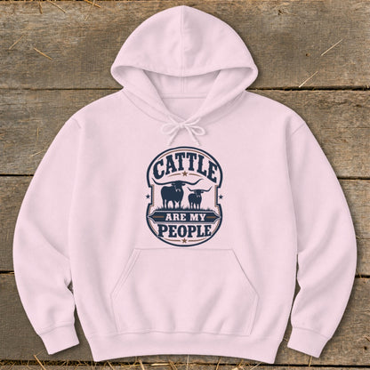 Pink hoodie with "Cattle Are My People" text and bull silhouettes graphic.