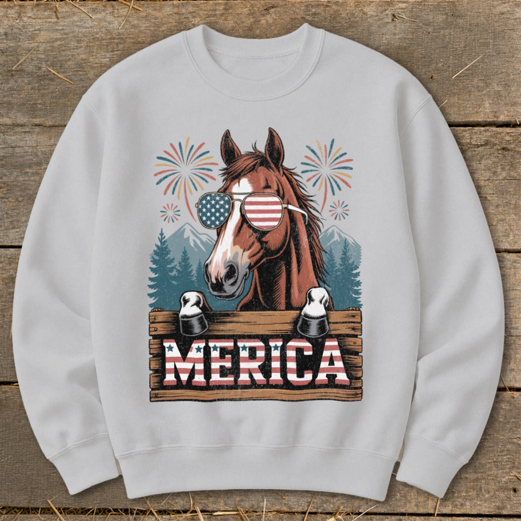 Brown horse wearing American flag sunglasses with "MERICA" text.