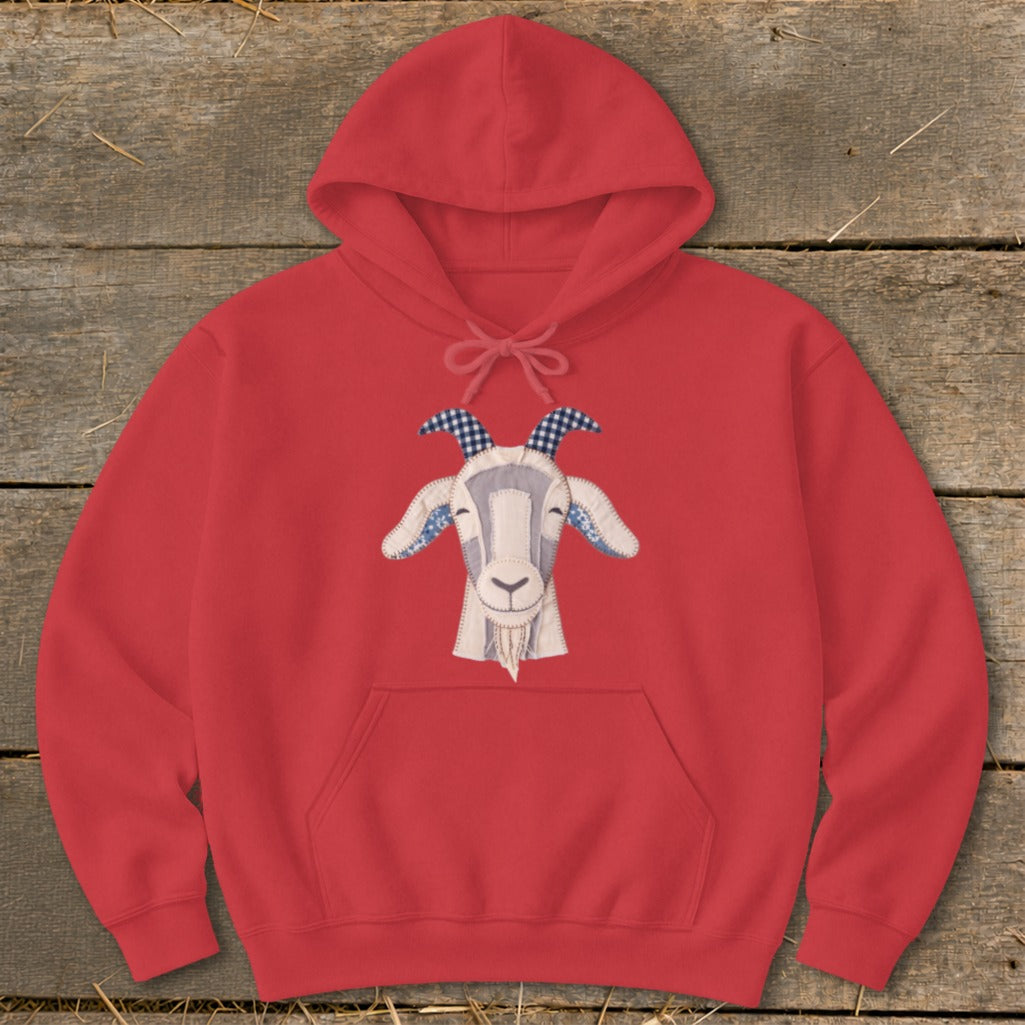Red hoodie with a patchwork goat face graphic on the front.