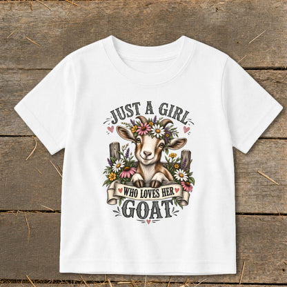 White t-shirt with graphic of goat wearing flower crown, text reads "Just a Girl Who Loves Her Goat".
