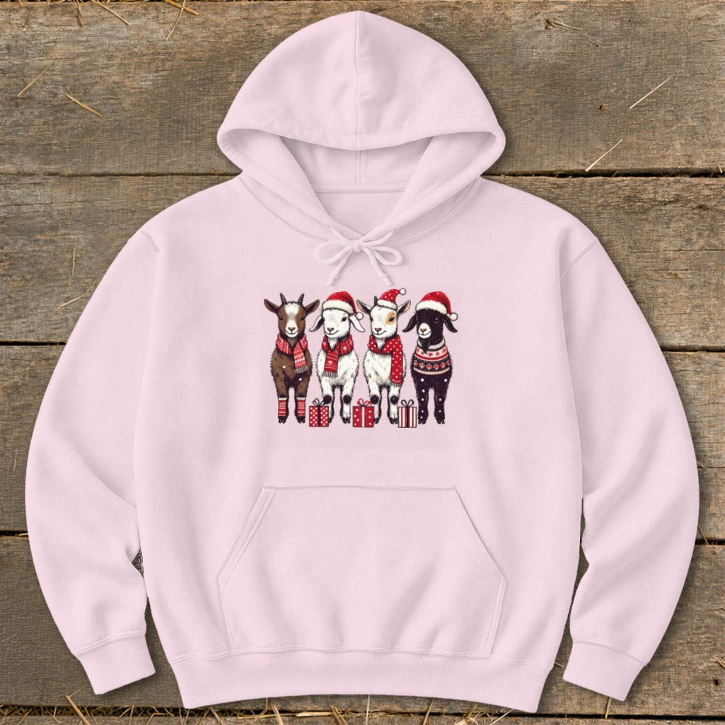 Pink hoodie with a Christmas graphic of four goats wearing Santa hats and scarves.