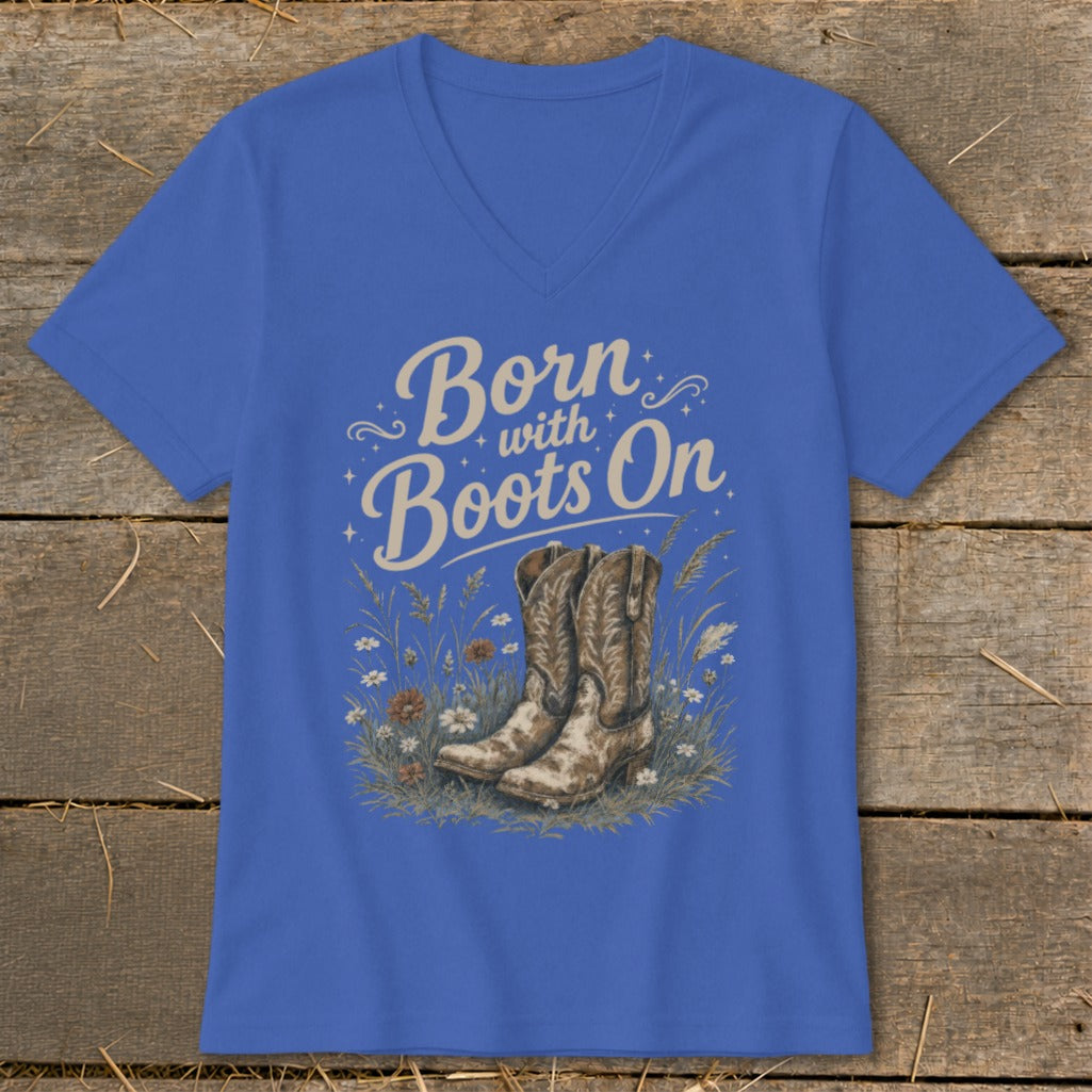 Blue v-neck t-shirt with "Born with Boots On" and cowboy boots graphic.