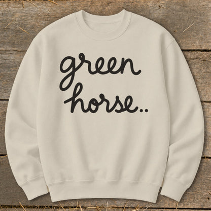 Cream sweatshirt with black cursive text reading "green horse.."