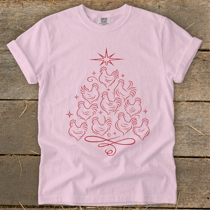 Pink t-shirt with a red line drawing of a Christmas tree made of chickens.