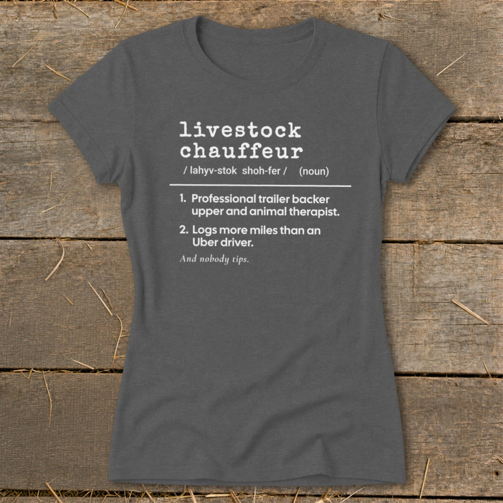 Dark grey t-shirt with white text defining "livestock chauffeur".