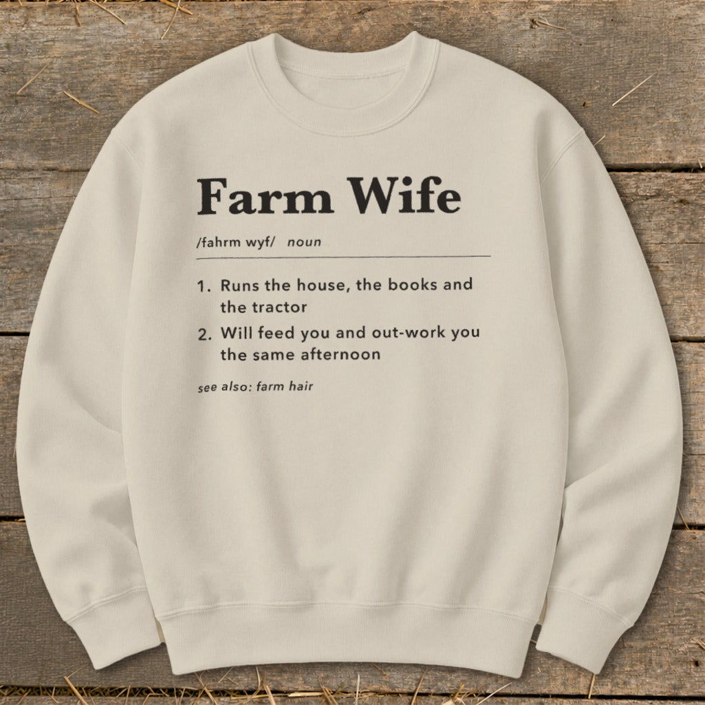 Light cream sweatshirt with "Farm Wife" definition printed on it.