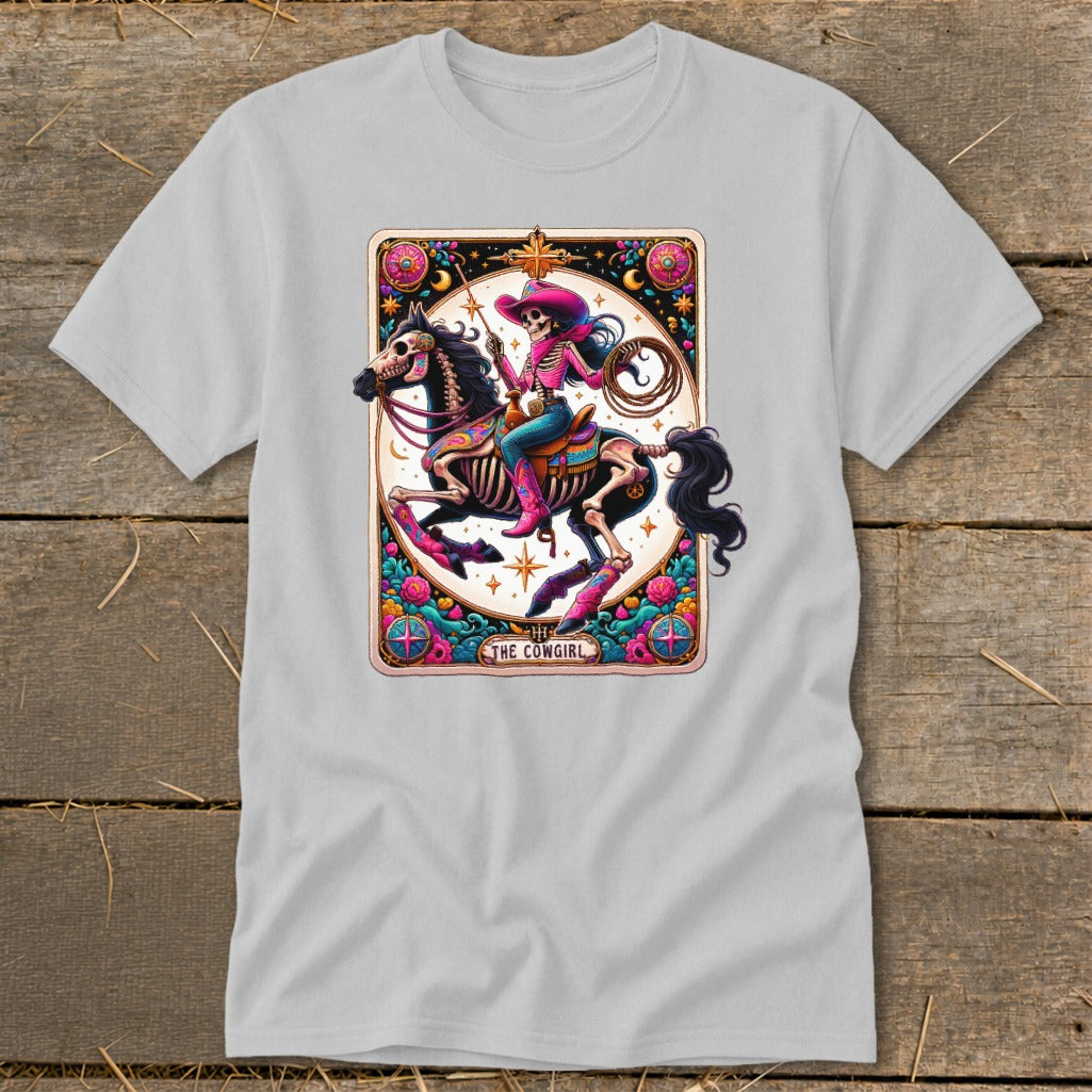 Skeleton cowgirl on a horse, with "The Cowgirl" text in a tarot card design.