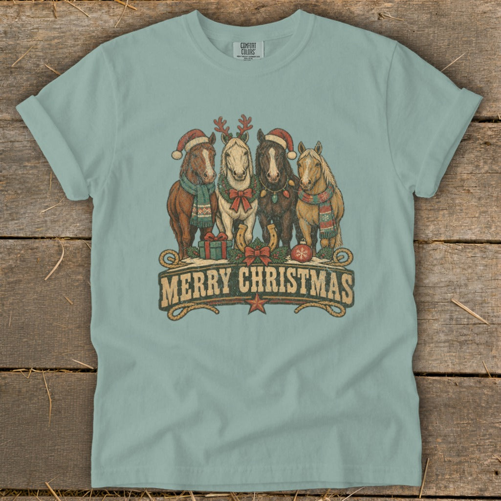 Four horses in festive Christmas attire, with "Merry Christmas" text.