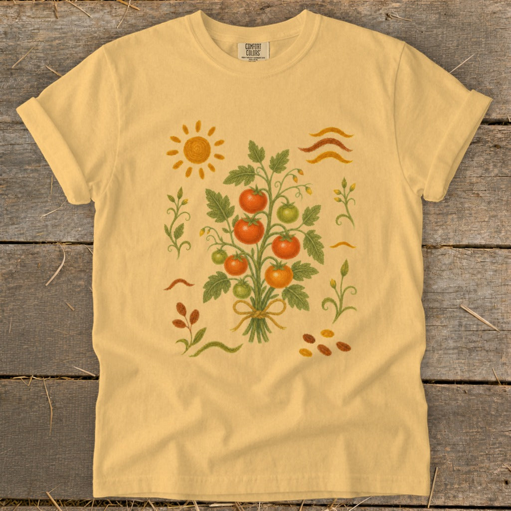 Yellow t-shirt with a watercolor-style tomato plant graphic and sun.