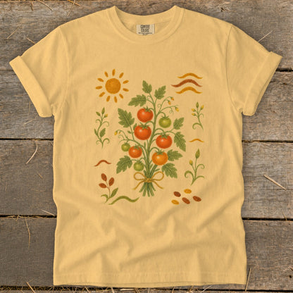 Yellow t-shirt with a watercolor-style tomato plant graphic and sun.