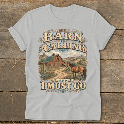 T-shirt graphic with text "The Barn is Calling and I Must Go" and farm scene.