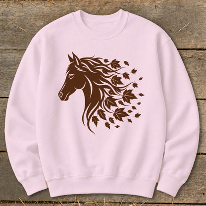 Pink sweatshirt with a brown horse head and falling leaves graphic.