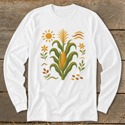 White long sleeve shirt with corn stalk, sun, and floral graphic.