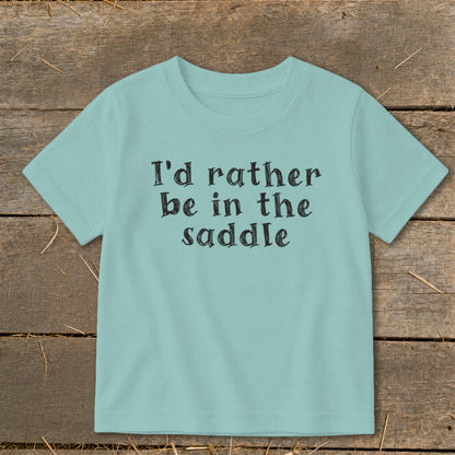 Teal t-shirt with black text that reads "I'd rather be in the saddle".