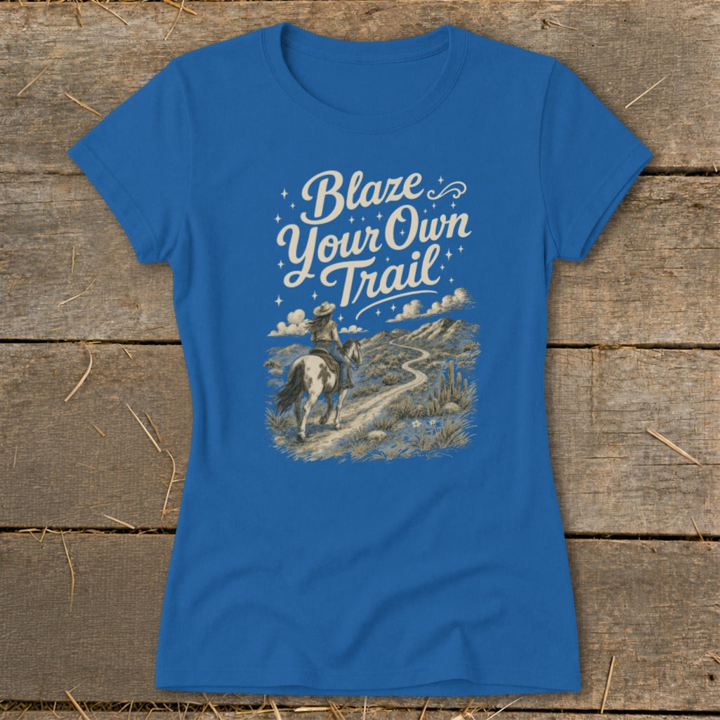 Royal blue t-shirt with "Blaze Your Own Trail" and a horseback rider on a desert path.