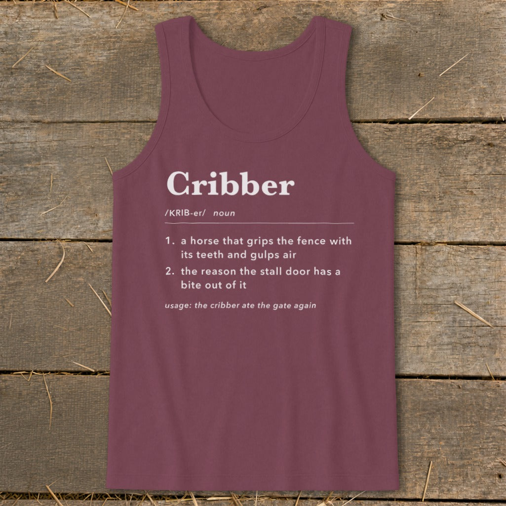 A dark red tank top printed with a humorous dictionary definition of the word cribber.