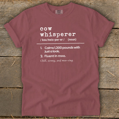 T-shirt with "cow whisperer" definition: calms 1,200 pounds, fluent in moo.