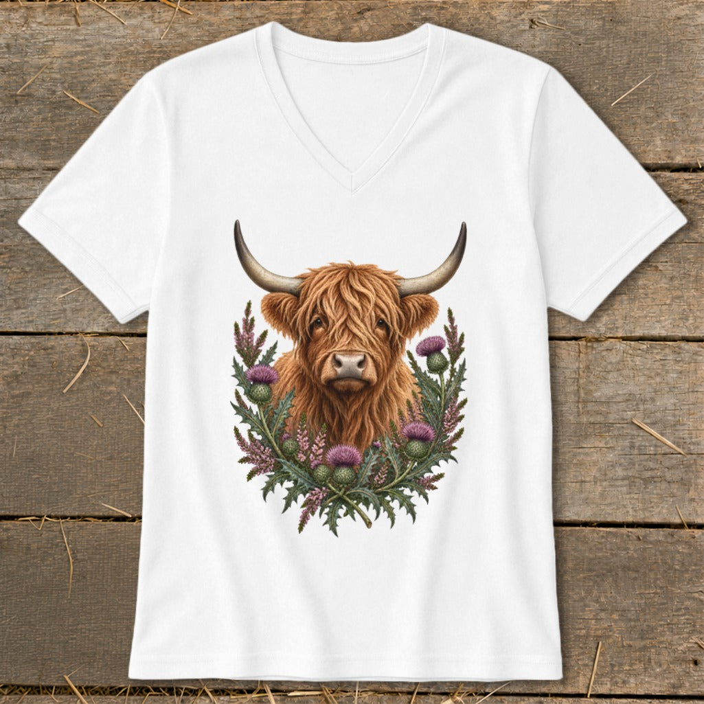 White v-neck t-shirt with a Highland cow and thistles graphic.