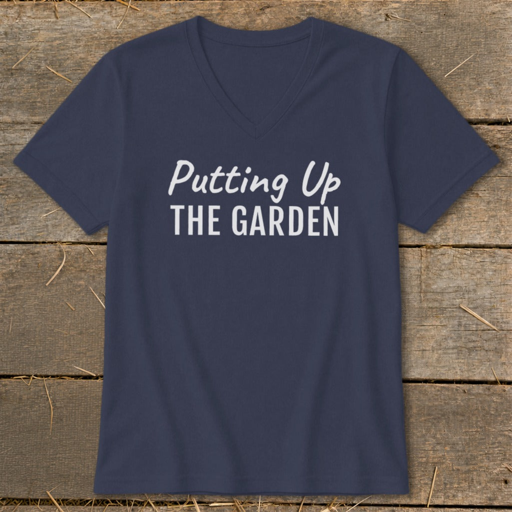 Navy v-neck t-shirt with white text that says "Putting Up THE GARDEN".