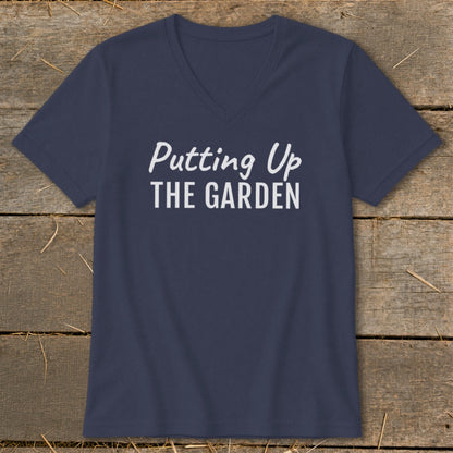 Navy v-neck t-shirt with white text that says "Putting Up THE GARDEN".