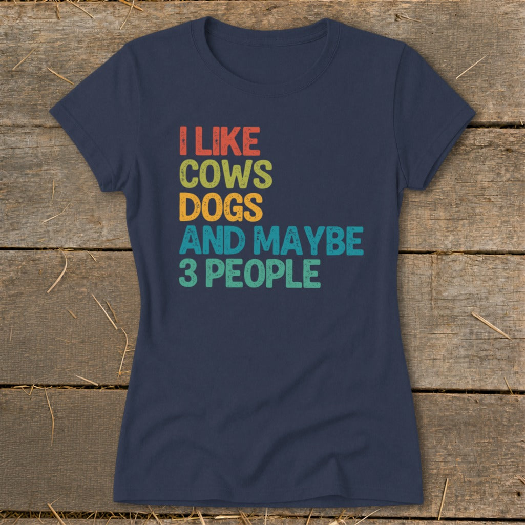 Navy t-shirt with text "I like cows dogs and maybe 3 people".