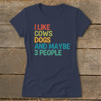 Navy t-shirt with text "I like cows dogs and maybe 3 people".