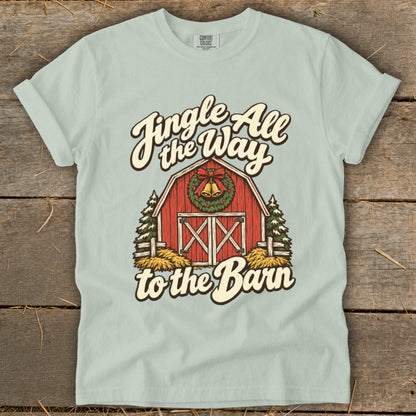 Light blue t-shirt with a red barn graphic and "Jingle All the Way to the Barn" text.