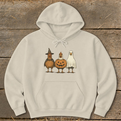 Beige hoodie with Halloween chickens dressed as a witch, pumpkin, and ghost.