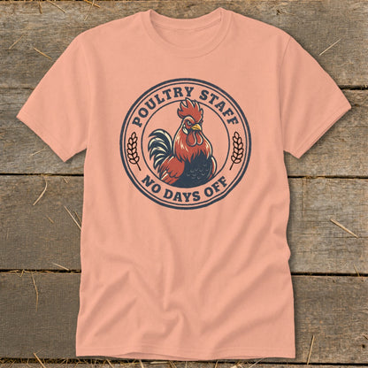 Peach t-shirt with a circular graphic featuring a rooster and the text "Poultry Staff No Days Off."