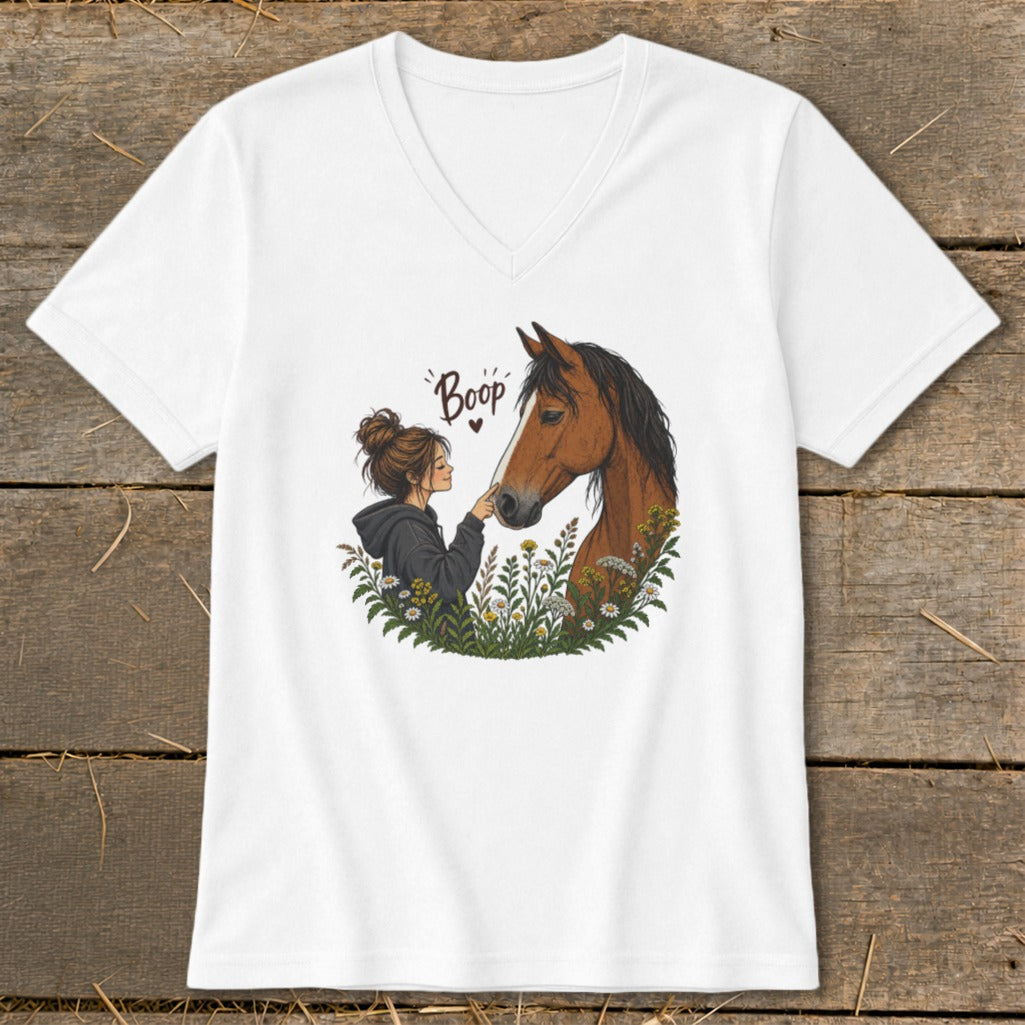 Girl booping a horse's nose with the word "Boop" above.