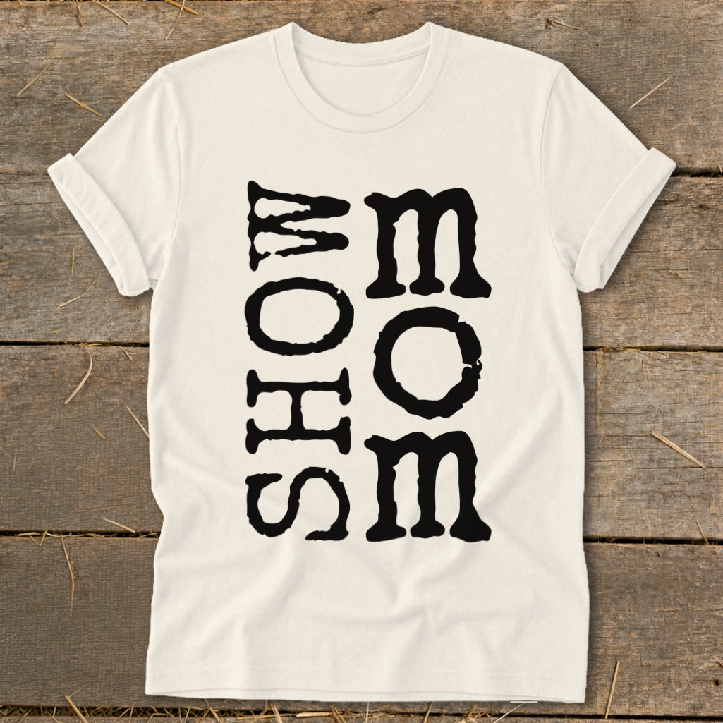 Cream t-shirt with vertical "MOM" text in black, distressed font.