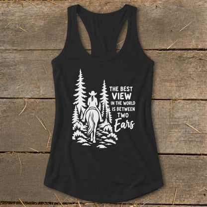 A black women's racerback tank top featuring a white graphic of a horseback rider in the woods and text that reads "The best view in the world is between two ears."
