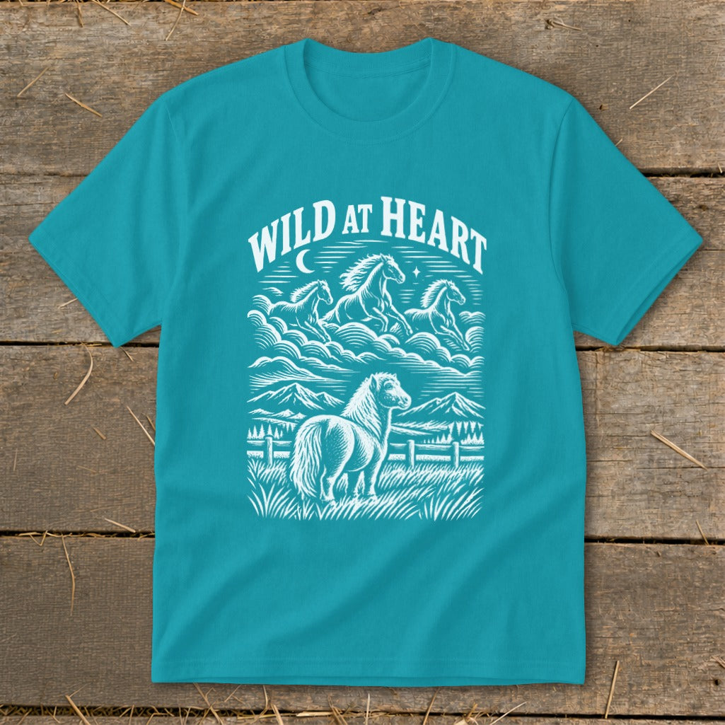 Teal t-shirt with white "WILD AT HEART" text and horse illustration.
