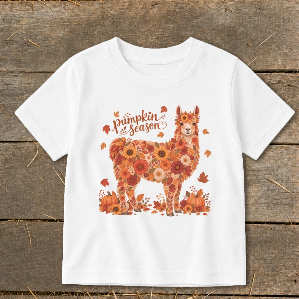 White t-shirt with a floral llama graphic and "Pumpkin Season" text.