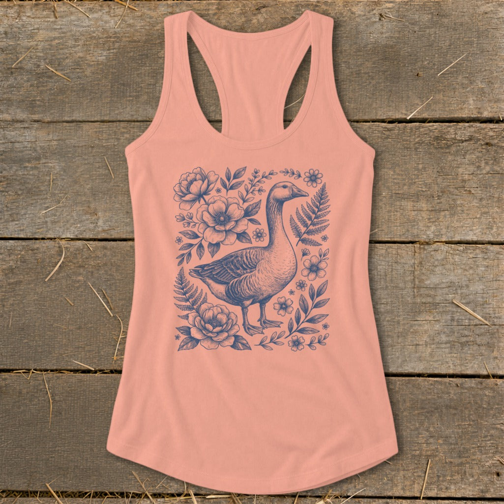 Peach racerback tank top with a blue goose and floral sketch design.