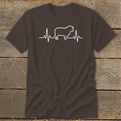A dark brown short-sleeved t-shirt featuring a white graphic of a sheep integrated into a heartbeat line.