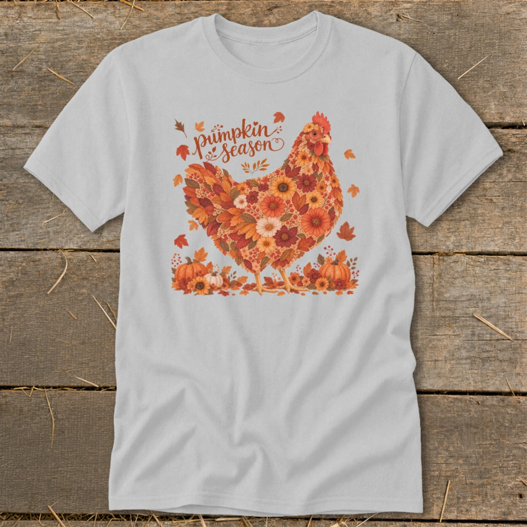 White t-shirt with a chicken illustration made of autumn leaves and flowers.