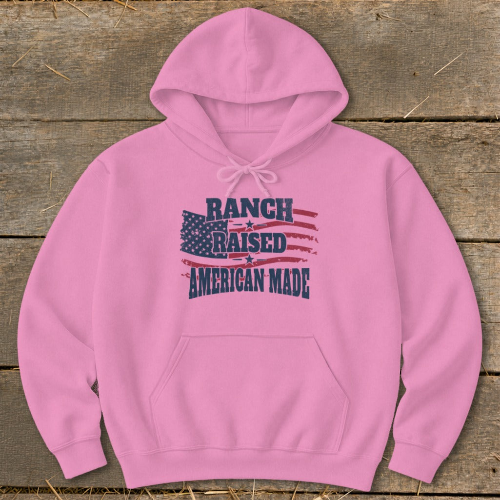 Pink hoodie with "RANCH RAISED AMERICAN MADE" and American flag graphic.