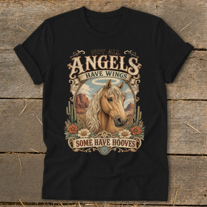 Black t-shirt with a horse, desert scene, and distressed text that reads "Not All Angels Have Wings Some Have Hooves".