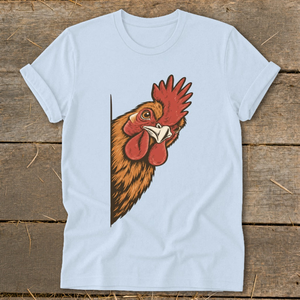 Light blue t-shirt with a cartoon rooster peeking from the side.