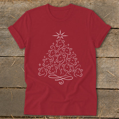 Red t-shirt with white outline art of cows forming a Christmas tree.