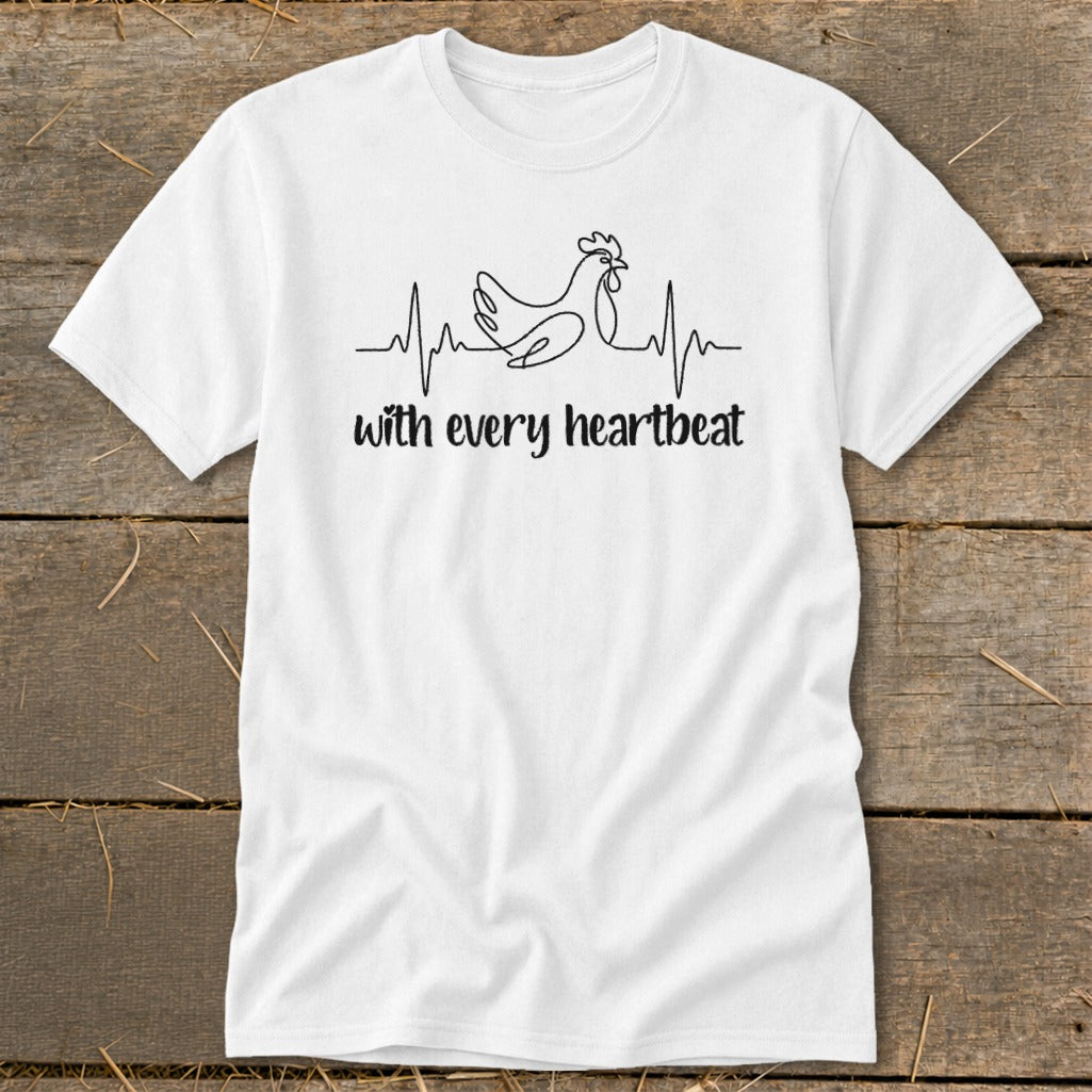 White t-shirt with black line art of a chicken within a heartbeat graph and text "with every heartbeat".