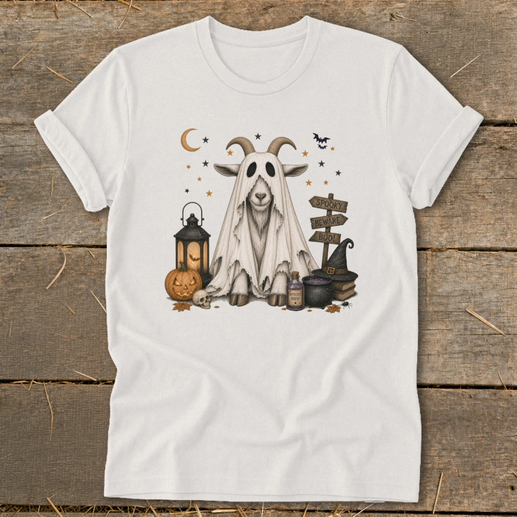 White t-shirt with Halloween graphic of a goat in a ghost costume and spooky signs.
