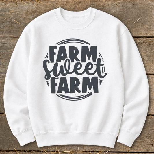 White sweatshirt with dark gray "Farm Sweet Farm" graphic on chest.