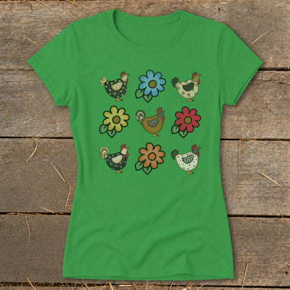 Green t-shirt with a grid of cartoon chickens and flowers in various colors.