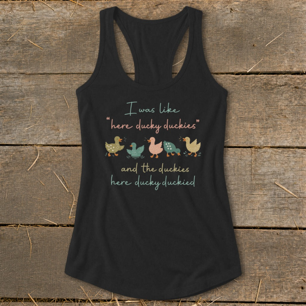 Black tank top with text "I was like 'here ducky duckies' and the duckies here ducky duckied" and duck illustrations.