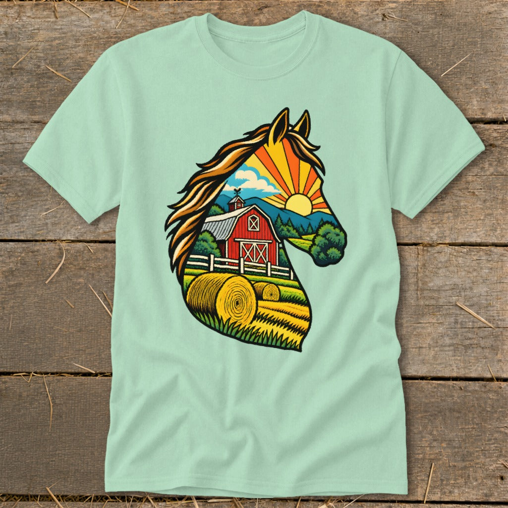 Light green t-shirt featuring a graphic illustration of a horse head silhouette filled with a farm scene.