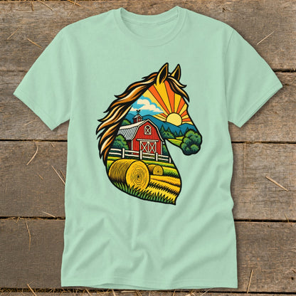 Light green t-shirt featuring a graphic illustration of a horse head silhouette filled with a farm scene.